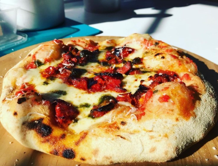 Chorizo and pesto pizza