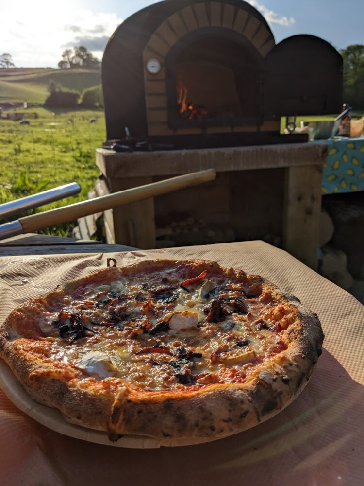 Wood-fired pizza @ Wytch Wood Camping Somerset