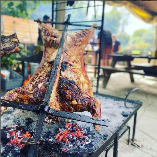 Wytch Wood Camping and Glamping is part of this year's Somerset Food Trail! Lamb Asado cooking
