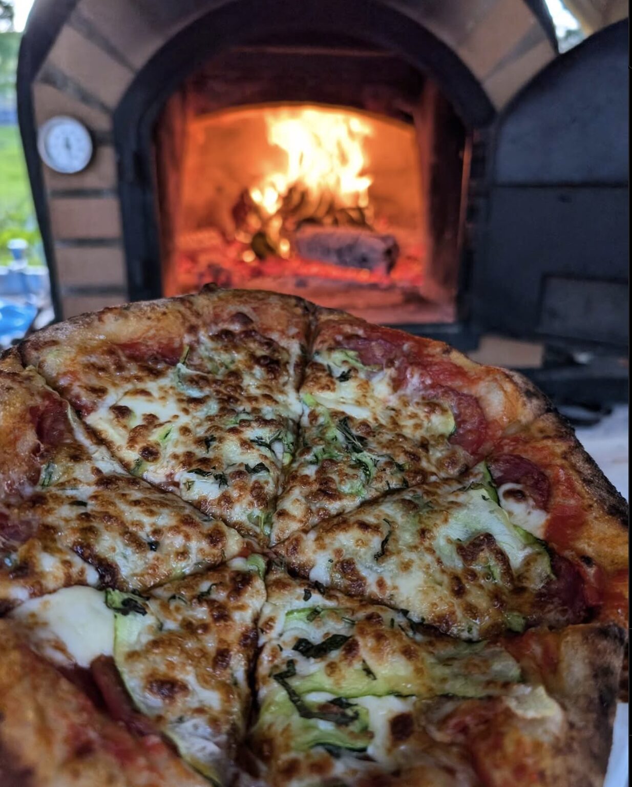 PIZZA AT WYTCH WOOD CAMPING & GLAMPING AN AWARD-WINNING, SUSTAINABLE WOODLAND CAMPING AND GLAMPING RETREAT IN SOUTH SOMERSET.